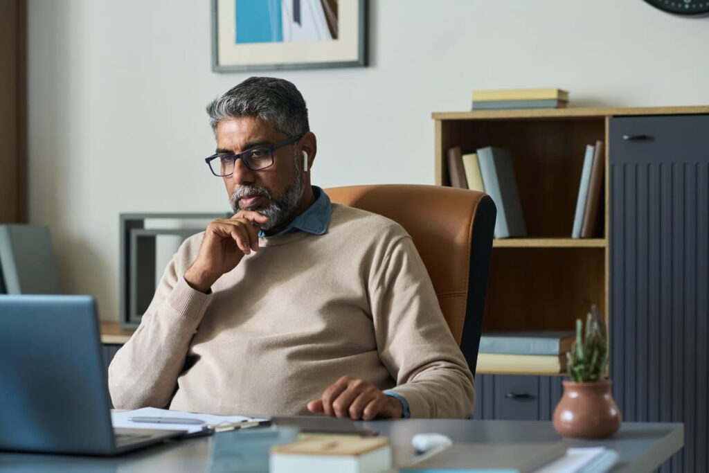 business leader sitting at desk