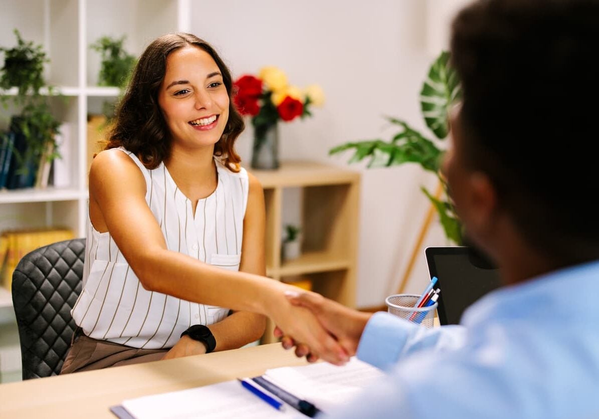 job candidate shaking hands in interview