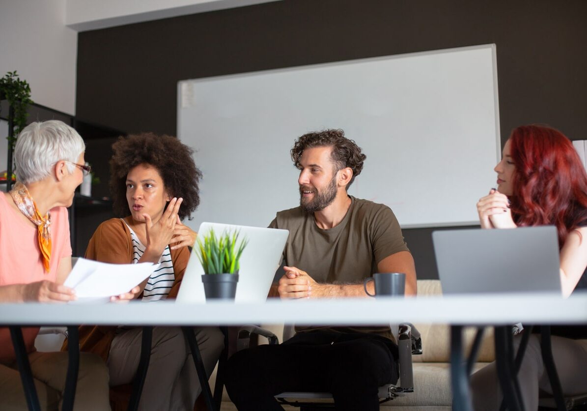 multigenerational professionals in office